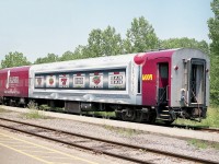 Posting this because I am curious about it. I got a few photos of this car on train #93 (Toronto to Niagara Falls) in the summer of 2006.
I know it is the "glenfraser" lounge car #1750. Understand it had a casino in it!! Came to VIA from BC Rail in 2002 and that they 'winterized' it in 2005.
Nice rolling billboard for VIA.  But I am wondering; when and for how long was this wrap applied? I seem to recall it only that one summer.
THANKS!!