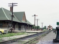 A nice view looking eastward at the CP Budds 9070 and 9061 laying over on a Sunday.  The "Budd Run" is long gone but the station still remains in location; now a pizza restaurant as I understand it..