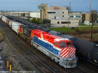 In response to <a href=http://www.railpictures.ca/?attachment_id=43446 target=_blank>Steve Danko's unbelievable shot of a VIA at Macmillan Yard</a> and I'm glad he posted it, I saved this for last and makes a good segue. As the sun tries its best to peek through between storms I was able to capture X376 passing the former RTC building (RTCDave's former home away from home!) and main administration office for CN's Macmillan yard just as 376 moves to double onto their train before departure. This was the first time a CN heritage unit led any CN train, and i'm very much looking forward to everyone's shots as these units cross our great country. Post 'em when you have 'em folks! Once the IC/EJE/WC units get in the lead in Canada first person to post a shot on this site can have top of the banner on our front page.<br><br>Hats off to CN for their hard work in putting this together.