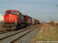 Back when CN 582 ran to St. Thomas in daylight (and 584 at night), OSR wasn't even in the picture and the St. Thomas and Eastern was the only shortline that ran into St. Thomas yard. NS still ran into St. Thomas when I took this picture (for a few more days), and CN and CP interchanged on the Wabash Transfer in St. Thomas as pictured above. Power from 386/7 was used on 582 which was just about anything on hand, such as seen in <a href=http://www.railpictures.ca/?attachment_id=23212 target=_blank> this photo </a>. A more mundane power set is shown on this day in December 2006 but to have this on the Wabash Transfer now..?? seems out of place. Only OSR uses this track today and no interchange occurs on it either.