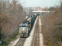 CSX 6352 and 6246 have just cleared thru Clifton Hill area on their trek westward in this image shot from near the base of one of the city's towers(Skylon). It was a treat to see Seaboard paint still adorning units which  were all part of the Chessie System family...and since 1980 known as the CSX.