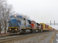 A late CN 149 is passing through Coteau with IC 2457, CN 2607, CN 5727 and a 574-axle long train.