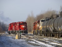 CP 251 with CP 6018 & CP 7011 starts to leave Sherbrooke as it slowly passes CP F20 with CP 2261 & CP 2307 for power.