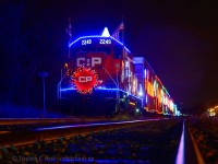 With the 2020 <a href=https://www.cpr.ca/holidaytrain target=_blank> Holiday Train becoming virtual</a> tomorrow (December 12) due to obvious reasons, I thought I'd pull an old image of mine out from the 2014 train when the ECO's made their first of many treks across the country hauling the Holiday Train.  What was great is this was the first year, to my knowledge, they had amazing crowd control so you could get a clear shot of the train - I took this photo with permission of the CPR Police guarding the crossing :)<br><br>Be sure to offer your usual support to our friends at the Canadian Pacific for this years event and tell your friends and family, there are sure to be some amazing surprises in the virtual event. There will be an appearance by CPR 2816 under steam in 2020! Cheers and wishing everyone a Merry Christmas (a little early!).