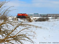 End of the line: The OBRY is now slated to <a href=https://ca.news.yahoo.com/end-line-100-old-rail-204254603.html target=_blank>end operations on December 31 2021.</a>. Get your shots! However, here's some really uniue stuff that happened on the line. What's even more interesting is it was only about 4 of us chasing this.. don't know how.. <br><br>
With a dome car on the Owen Sound subdivision hauled by CP, you'd almost think we're staring at some kind of alternate reality on the Owen Sound sub, where passenger services were never discontinued and wild success of business allowed it to continue into the 2000's with dome cars. But this image was made possible by circumstance. The OBRY/CANDO had (and may still have) an agreement that when they had engine trouble, CP would supply a unit temporarily. This happened a few times but rarely did it make it onto a passenger train. In 2014 it happened, twice: First as seen here with 8249, but since 8249 blew up good not long after, CP ended up supplying <a href=http://www.railpictures.ca/?attachment_id=41775 target=_blank>brand new 2267, with barely 1000 miles on the odometer, which ran on the next week's Snow Train</a>.<br><br>But it gets better, the Dome car was also not supposed to be on the train that day, only because the train lines were frozen did they have to take it with them! Double circumstance made for <a href=http://www.railpictures.ca/?attachment_id=20690 target=_blank>really unique photography opportunities</a> that I had no idea I was getting into , other than the CP unit. What fun. CANDO continued to operate the Explorer for 4 more years.