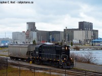 A nice thing about cloudy days is you can shoot any angle you want, this is one angle that would be impossible in the winter in sun. After lifting a car from ADM Milling, Trillium's RS18 1859 is heading back north with more work to do in Port Colborne on this cool winter's day. This was a good 'forced' vacation day from work - <a href=http://www.railpictures.ca/?attachment_id=27684 target=_blank> Here's a shot I posted a couple years ago</a> from the same trip. A couple more saved for later. 