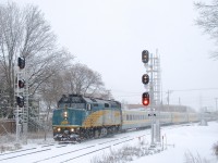 VIA 63 splits a set of signals with VIA 6421 up front and VIA 901 on the rear. At right CN X306 is lined on the south track.