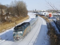 Frosty VIA 6419 brings up the rear of VIA 62 as it approaches a clear signal near Turcot Ouest.