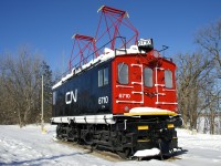 Preserved boxcab CN 6710 in the snow. It has been at this location a bit over a year now after being moved from near the Deux-Montagnes Station.