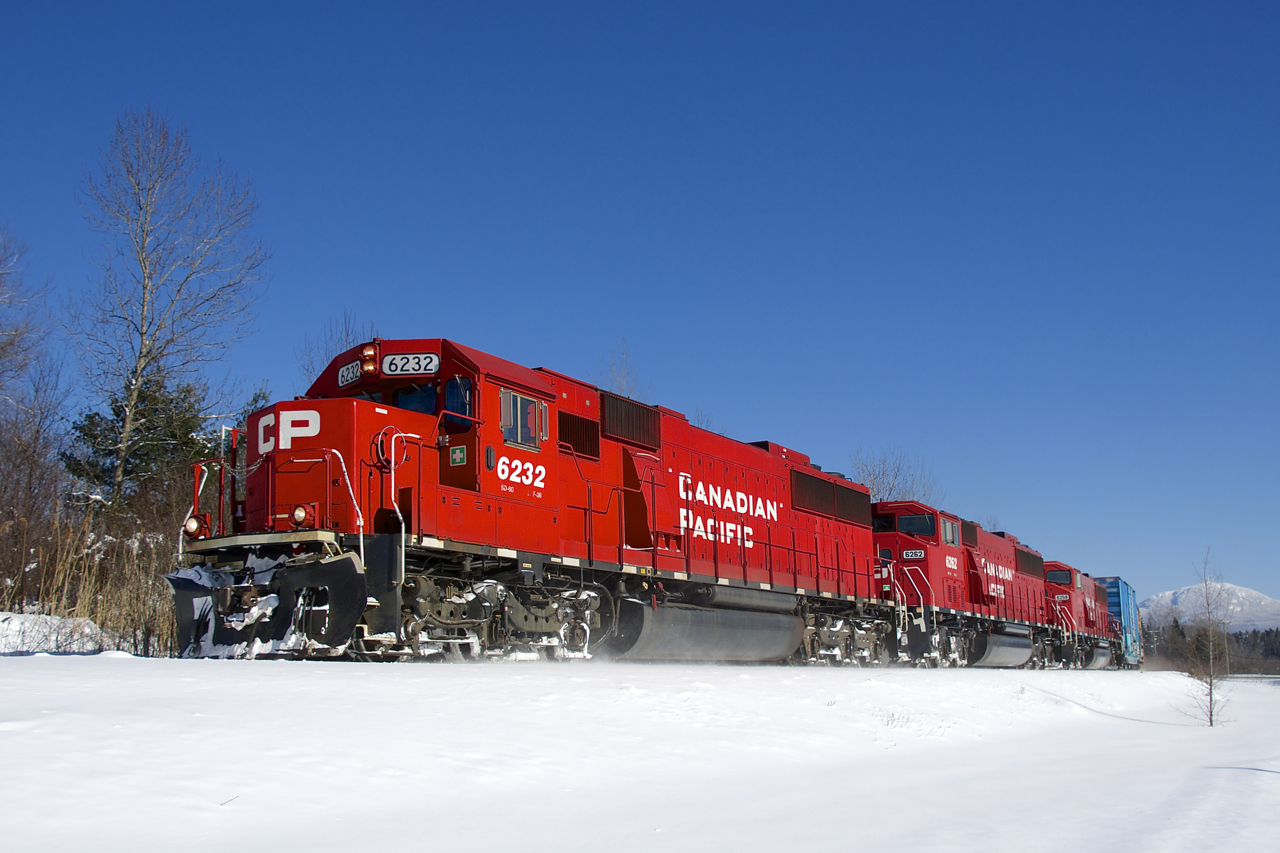 CP 251 has an SD60 and two of CP's five SD60M's (CP 6232, CP 6262 & CP 6258) as it rounds a curve on a frigid morning.