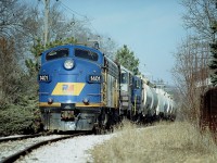 GEXR's 1401, lettered for RailAmerica, leads CEFX 6537 and RLK 4001 down the line from Goderich into Stratford. The train is seen slowing up for the jct at Cowie leading into the main yard.