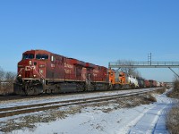 Thanks to a heads up (and a Sightings Group report) I headed out to try for a shot of the two WCOR (Wellsboro & Corning RR) units supposedly on their way to the Quebec Gatineau Rwy. Location I chose is at the end of Pietz Rd, as it dead-ends at the tracks.  Power is CP 8819, 8849 WCOR 309, and 307. Both units still in their former QNSL paint, although one can see a rather poor attempt at 'rebranding' the locos as the paint has worn thru.
I understand the units were dropped at Welland yard.