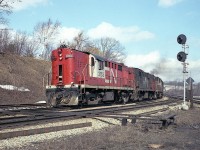 Good sized train, this one rolling west thru Bayview.  Weekend passenger trains were often very well patronized, and this one consisted of 13 cars behind CN 3153, 3113 and 3155. The weekday usual was one unit and 5 or 6 cars.`