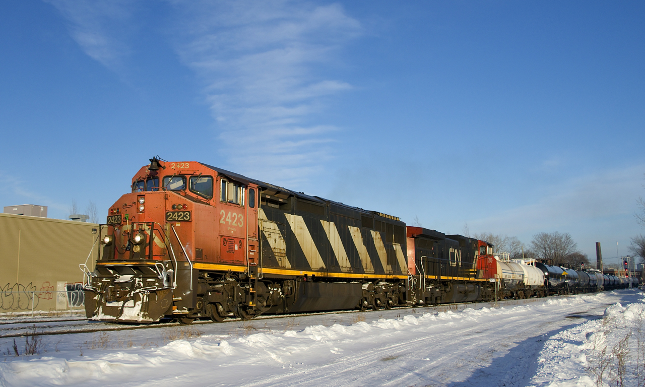 CN 323 is back from Vermont with only 14 cars and CN 2423 and CN 2640 for power. Nice getting a cowl leading on CN as you never know when you'll be shooting your last one.