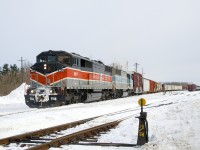 After having arrived at Farnham and changed crews, CP 251 is about to work the yard before departing for Montreal, with the conductor seen about 5 car lengths back. Power is SD40-2F's CMQ 9017 & CMQ 9011.