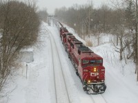 Snow is falling as CP 251 passes North Jct with an ex-SOO trio for power (CP 6262, CP 6252 & CP 6232).