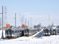 Numerous lines of MR-90 cars (surely the entire fleet) are stored at the Pointe-Saint-Charles Maintenance Centre, their service no longer needed and their continued existence very much in doubt. At far left can be seen the reason for their retirement, with REM construction ongoing here, as well as on the Deux-Montagnes line, where these cars were used until the entire line shut down at the end of 2020. Most of these cars had to be trucked from Deux-Montagnes to Saint-Jérôme, where they were put back on rails and brought here by F59PHI-led trains. The controversial REM project is a light rail line that will serve the Montreal area with grade-separated, driverless trains.