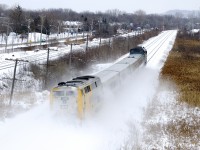 VIA 62 is kicking up some snow as it approaches a new set of signals a bit further ahead. Since this photo was taken a couple of weeks ago VIA Rail has cut service even more and VIA 62 no longer runs.