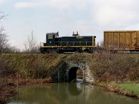 Quno-1, the former CN 7212, is seen working a cut of cars for what was Resolute Forest Products at the point of its shutdown. This huge newsprint mill was put on "indefinite idle" in March of 2017 after having sent most of its workers home Dec 2016. Newsprint usage was down 70% over the years as fewer newspapers are bought and read.
Times change. The locomotive is  shoving a long line of wood cars into the plant.
This activity was not easy to photograph. Train movements were very irregular.