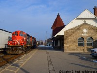 A "Teddy Bear Extra" operating on the Guelph sub - what does this mean? A term I've heard on CN a few times mostly in Sarnia, usually consisting of trainees learning how to railroad in the yard. In this case it was actually a qualification run for card carrying crews to become familiar with the Acton Grade on the Guelph sub mainline. There were a couple runs dedicated to this in January where L540 only ran back and forth to Georgetown from Guelph to cover the number of trips to help qualify a crew member. Running Kitchener to Georgetown, the crew ran around the train at the station, then back to Guelph, entire train around the wye, and back again to Georgetown and repeat until they ran out of time to get out of the way for VIA 87, returning to Kitchener. No work performed. Nothing.There were a couple occasions that L540 after working Canwel in Acton, would do the run around move in Georgetown, presumably a way to kill 2 birds with one shot.<br><br>Either way, a GP9 at the 1858 built Georgetown Station with the sun out on an otherwise cloudy day was a nice treat, and this is one of my favourite area stations. Georgetown was one of my favourite places to visit as a kid.<br><br>Also a history note for the people familar with the area: the old "hotel" that was at the entrance to the Georgetown parking lot? While there were efforts to save some of it for heritage purposes, it's all gone now. Kaput. Now a lot for sale. For shame.