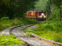 Snaking around the S curve in Corhwin Ontario, on OSR's second last day servicing Guelph, Job 1 is southbound with new GWRR power in tow in preparation for the takeover that coming weekend. 