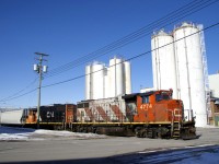 The Pointe St-Charles switcher is respotting a plastic pellets car before departing the Turcot Holding Spur light power. They had just brought a boxcar to the Kruger plant, out of sight to the left here.