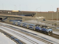 A pair of F59PH's (AMT 1349 & AMT 1344) lead EXO 1207 out from under the rebuilt Turcot interchange.