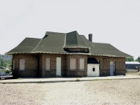 Another in the series of stations visited over the years.  Kincardine, on the shores of Lake Huron. The railroad first came to town back in 1873, and opened in 1874, upon the completion of a 66 mile branch out of Palmerston. I believe this was the second station at this site, and was removed around 1983. Salt, lumber and miscellaneous Great Lakes shipping made this a once busy port.
All gone now, the former rail line has been taken up and the Port Elgin-Kincardine stretch is now the Bruce County Rail Trail. A "replica" station has been built near where this one stood, down on what is called "Station Beach". Washroom facilities here. Marina next door. Its a busy place in summer.