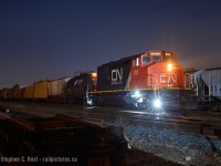 A solo CN SD40-2 on a mainline freight in 2021? Pinch me. With over 5000 foot of train, work at Beachville, Brantford and aldershot, there was no shortage of complaints from the crew about the 'Sarnia yard engine' assigned to the job, but the photographers didn't mind... thank goodness they had work at Brantford, sometimes you just never know. With the headlight streaming in the cool damp Brantford night, the conductor is walking the train to make the cut for a setoff and lift in the Brantford yard just after arriving. Photo notes, 50mm f/1.8 which gives the nice 'star' effect for night shots. Anyone here use a 'star filter' to get the same effect? Only my 50mm lens does this.