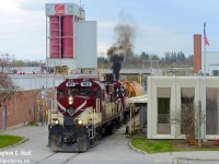 And just down the spur from my <a href=http://www.railpictures.ca/?attachment_id=44685 target=_blank> last shot</a> is the Owens Corning Fibreglass facility. This was an angle I didn't get back in 2014 - a year or two later Fibreglass stopped using rail service and I regretted that decision. But in 2020 fibreglass came back to rail - and what's changed is their formerly white cars are now orange due to lot of rust on the exterior but other than that not much has changed.  RS23 505 kicks in good with a puff of MLW smoke as the crossing for York Rd is protected and the train accelerates to depart the plant. Soon, the crew will close the gates, throw the derail and head to the north end of town. This facility is now serviced by GEXR.