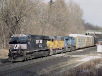 Another mixed power CN train from those power short entertaining days not so long past......I am following #393 West, and this image I rather liked.......NS 9811, HLCX 5994 and NS (CR) 8444 take Copetown hill rather handily with a shorter train than I was used to.  Thats the Inksetter Rd bridge in background.