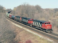 A glimpse back 30 years ago today, April 11, 1991. A beautiful day at Bayview. It was still rather common to see some big MLWs rolling; but we all knew they were on their way out, as not that many were in the lead position any more. Not much green yet, after a typical winter. Average, I'd say. After all, the year 2021 had not much of a winter. Foliage is at least 2 weeks ahead this spring.
As seen from the Plains Rd (former hwy 2) bridge mid-afternoon; CN 9419, 2314 and 2013 rumbles westbound.