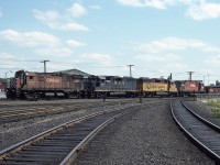 Northbound CP 4244, B&O 4807, 4804 and CP 4228 is rolling by the entrance to the sprawling Sudbury yard which is located in the heart of the city area. The bridge railing on right is the Brady St underpass. Train is probably going directly thru to Cartier, about 25 miles up the line.