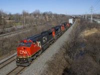 CN 321 has a transformer as the second car (on 8-axle flat QTTX 130567) as it heads west with CN 2176, CN 8011 & CN 8937 for power.