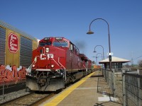 CP 143 with CP 8071 & CP 8899 for power is passing a CP 112 which is held out until CP 143 clears Dorval. A KCS logo on an autorack at left brings to mind the recently proposed CP-KCS merger.