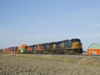 CN 327 has a healthy 45 intermodal platforms up front as it heads south with a mixed bag of CSX and CN power (CXT 472, CSX 7216, CN 8922 & CN 8837).