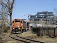 The Pointe St-Charles switcher is picking up grain empties at Ardent Mills.