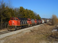 it was good while it lasted, but for a brief period four "zebra" striped units were assigned to Kitchener and on occasion all four were lashed up together. With less than an hour of sun left, L568 has departed Kitchener rather late and the quartet of 4 axle power sounds quite good accelerating out of Kitchener with a loaded train of potash and grain.<br><br>BTW: For anyone reading this - let's do Amtrak Day in celebration of its 50th anniversary May 1'st. Sharpen your scanners, we'd love to see some oldies too!