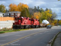 With interurban roots, the Grand River Railway runs alongside King St between Freeport and Parkway in Kitchener. Imagine my surprise to chance on this move while out for a drive, and on an otherwise cloudy day, getting sun where it counts the most. This dimensional which in years past would have been moved GEXR/CN is going CP to the CNR interchange in Kitchener, then over to Goderich on GEXR via CN. For more on the Grand River Railway/LE&N get a copy of "Steel Wheels along the Grand" by George Roth from your local library. Copies are very hard to come by for sale.