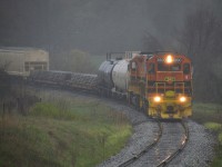 One more shot from a terrible weather day of the G&W running from Guelph Jct to Guelph in fog, rain, mist and generally just miserable conditions.  This image is of QGRY 3800 & 800 just out of Moffat, about to cross Concession 11......with Corwin the next hamlet en route to Guelph.  Pouring rain here.