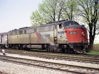 During those lean struggling early Amtrak years it was not often I saw the "Rainbow" with just the one loco around this time.  I guess they had some faith in it. :o)
AMTK 410 is shown here stopped for passengers at the old flat topped MCRR/TH&B station. (in behind)  This structure was torn down around 1990.