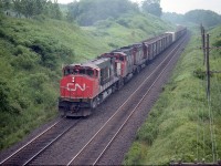 It looks a lot different looking eastward from the Inksetter Rd bridge at Copetown than it does now. This was a nice location that has gotten tighter with each passing year as foliage is allowed to creep ever closer over the RoW.
This image from back in 1984 has CN 2543, 9514 and 3208 up front of a westbound seemingly all boxcars. I rather miss them. It gets me to wondering what was in all those cars that we do not ship now.
The three locomotives featured are of course gone from the CN roster. CN 2543 was renumbered to 3543 and eventually ended up at Hudsons Bay Rwy. CN 9514 sold to Progressive Rail 2002; CN 3208 retired by 1989.
