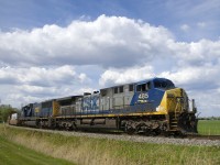 With AC4400CW CSXT 485 and rebuilt CSXT 4530 for power, CN 327 is rounding the wye that takes it from the Kingston Sub to the Valleyfield Sub. It will set off cars at Coteau before departing southwards.