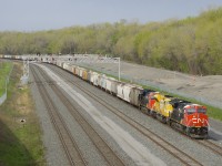 Grain train CN 846 has CN 3278, EMDX 7201 and CN 3125 (ex-GECX 2036) for power as it sits parked on track 29 of CN's Montreal Sub in the morning. Later in the day, the crew of CN 549 would bring this train to its destination of St-Hyacinthe. While most grain trains heading to Quebec originate in Canada, this one is hauling corn from Iowa.