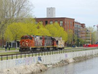 The Pointe St-Charles Switcher is heading towards Ardent Mills to pick up grain empties with CN 4774, CN 4709 and beat up shoving platform CN 79834.