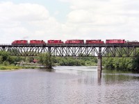 Rolling over the Grand..........CP 8221, 8237, STLH 8206, CP 4231, 1824 and 4223 look impressive out on the bridge. Even more so now, as this image was taken 24 years ago next week; all units in this consist are gone from the CP roster.