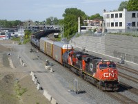 CN 306 with CN 2235 & CN 8825 for power are slowly approaching Turcot Ouest for a crew change.