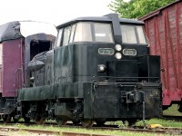 The GMDH-3, a one of a kind prototype.
In 1959 GMD embarked on developing a new type of small locomotives. This one was built in 1960. In 1963 it became a plant switcher for McKinnon Industries, known by most of as the GM Plant 2, Glendale Av in St. Catharines. Their rail connection is with CN at approximately mile 8.3; just east of the Welland Canal drawbridge. I recall the unit in the plant's yellow colours.  In 1992 the unit was sold to the South Simcoe Railway, a popular tourist train destination. It is here I saw it among other stored equipment.
In 1995 the board of directors felt there was little use for this unique engine and it was offered for sale.
A fund for intent to purchase was started up by the Southern Michigan Rwy, and was successful. The unit went Stateside. I recall seeing it in a pale blue scheme at Clinton MI a few years ago.
Canada's loss.