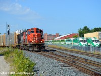 Continuing on my theme of GP9's, this is a what's old is new again - CN has come back to the Guelph sub after 20 years but there was quite a bit of change in the area. GO Transit now parks at, surprisingly enough, the Park St. layover (at right) right at the junction of the Huron Park spur and the Guelph sub. I've <a href=http://www.railpictures.ca/?attachment_id=11249 target=blank>used this location before for photos</a> before and it's wild to see how much has changed. Metrolinx is quickly fencing everything off around here though.... as alluded to in my prior Stratford picture. Change is happening really fast around here, which means money is being spent. All for good reasons mind you. I was attracted to Guelph sub operations in August as there was a nice pair of 4000 series GP9's bouncing around on L540 - time well spent for this gp9 fan.