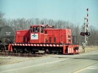 Companies along this road have come and gone so frequently it has been hard for me to keep track of them all. I recall Stelpipe the most; at this location on 615 Rusholme Rd in Welland that utilized a switcher is conveniently numbered '615'. This was the former Stelco 53, an 80 tonner that has also worked for Martech at this same location. I'm guessing it was around 2008 that Universal Resource Recovery set up shop here, and existed until June 2011 when they voluntarily closed up. URR was a"green bin" waste recovery outfit that was taking waste from landfills and recycling it. It was an indoor composting operation.  Decent idea for the times. But oh, the stink!!! Neighbours complained aggressively; filed their complaints over the fact they could not endure sitting outside their homes most days, especially hot ones......and the situation went to court. However, a $250,000 fine was not leveled until almost 2 years after the company had folded up and left. Now what?
This same locomotive toiled for Martech Industrial when it took over the location to do railcar repairs; and is still on site for current tenant K&K demolition company which is scrapping old CN locomotives. However, this is the only time I recall seeing the switcher with that Universal decal on the sides......as seen here out by Hwy 140.
